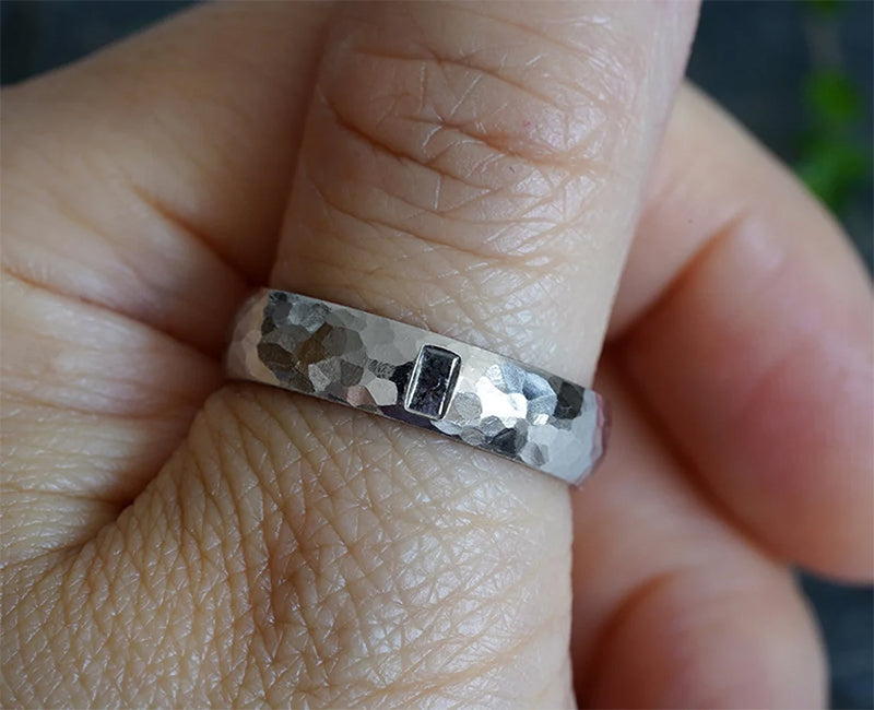 Hammered Effect Platinum Wedding Band with A Salt & Pepper Baguette Diamond