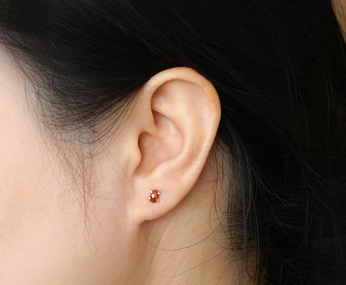 Oval Garnet Stud Earrings in Sterling Silver